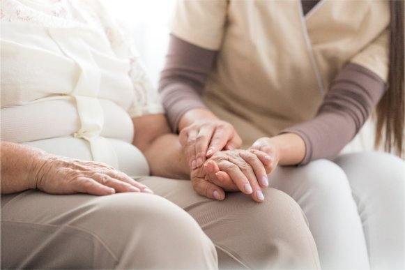 Caregiver helping a older person