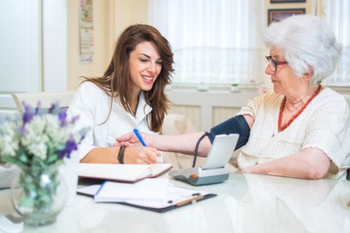 Home Health Care Visiting nurse with patient VNA Visiting Nurse Association